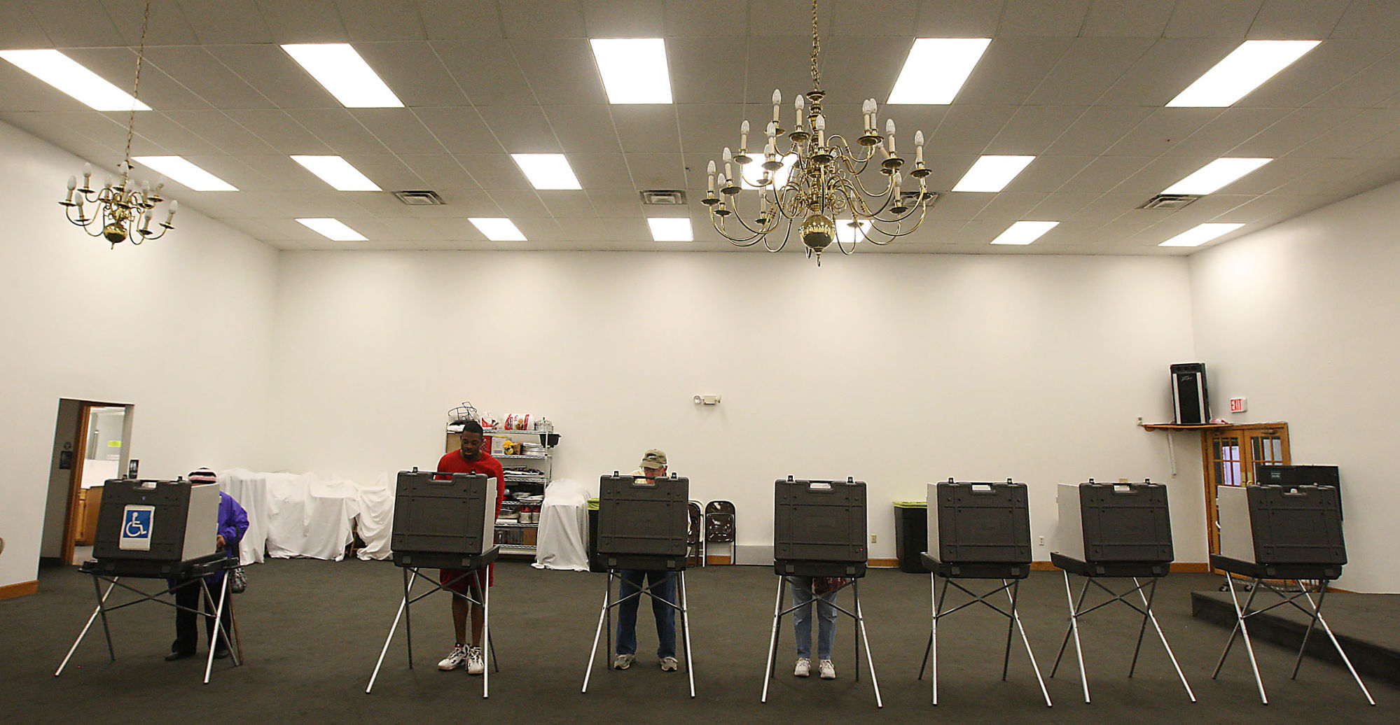 What if I want to vote in person but already have a mail-in ballot?